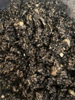 Una foto de Arroz negro con sepia