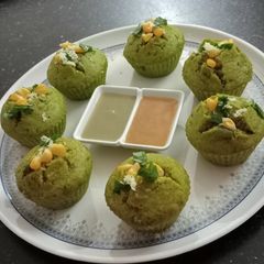A picture of Leafy greens and corn cups.