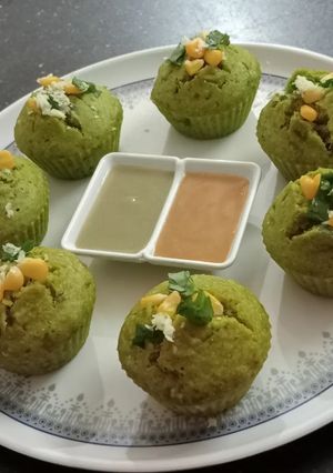 A picture of Leafy greens and corn cups.