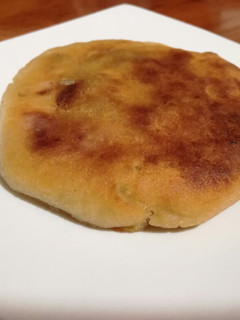 Una foto de Tortilla de papa con chicharrones