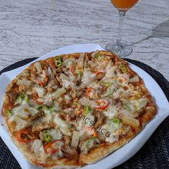 A picture of Chicken pizza.