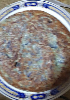 Una foto de Tortilla de patatas (patata morada)