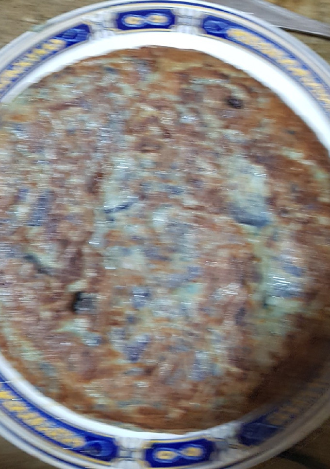 Una foto de Tortilla de patatas (patata morada)