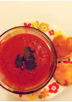 A picture of Tomato Coriander Soup with heart shaped fruit Scones.