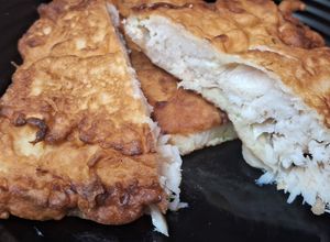 Una foto de Milanesa de pescado a la marinera