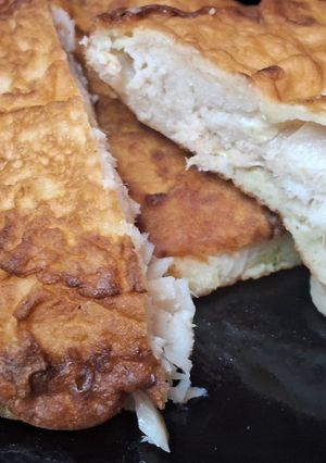 Una foto de Milanesa de pescado a la marinera