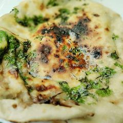 A picture of Stuffed aloo kulcha.