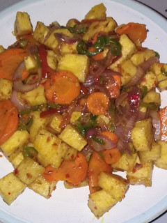 A picture of Fried yam with Veggies.