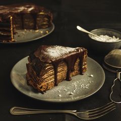 A picture of Cocoa Crêpe-Cake with the classic cheesecake filling.