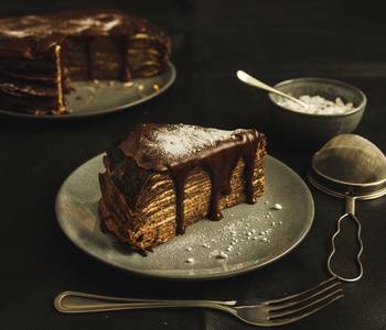 Unique Cuisine Cocoa CrpeCake with the classic cheesecake filling Savory Delicious