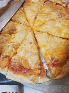 Una foto de Pizza masa fina😍😋