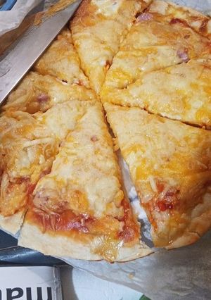 Una foto de Pizza masa fina😍😋