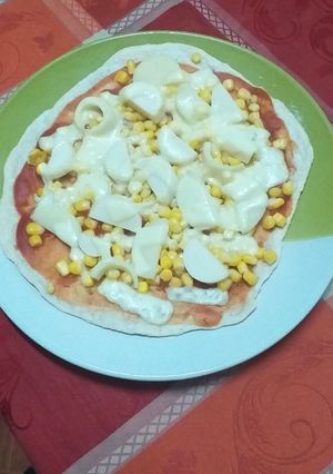 Una foto de Pizza vegetariana
