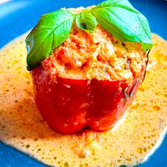 A picture of Easy Creamy Tomato Sauce Stuffed Bell Peppers with Meat and Rice by TastyPinch.