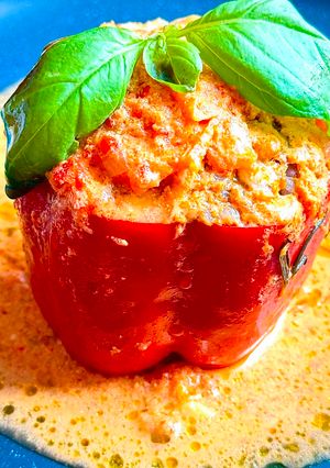 A picture of Easy Creamy Tomato Sauce Stuffed Bell Peppers with Meat and Rice by TastyPinch.