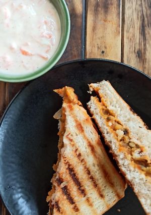A picture of Chanajor garam sandwich with smoky carrot dip!.