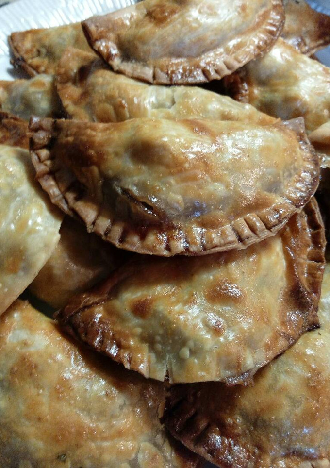 Una foto de Empanadillas al horno de setas y gambas