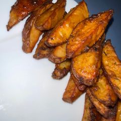 A picture of Potato wedges.