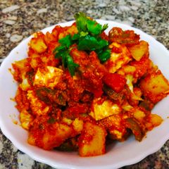 A picture of Veg kolhapuri in red gravy.