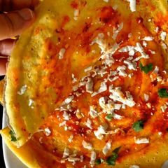 A picture of Schezwan Moong Dal Chila.