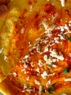 A picture of Schezwan Moong Dal Chila.