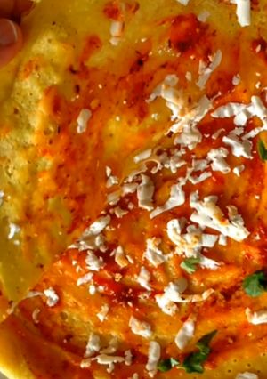 A picture of Schezwan Moong Dal Chila.