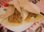 Una foto de fajitas de pollo