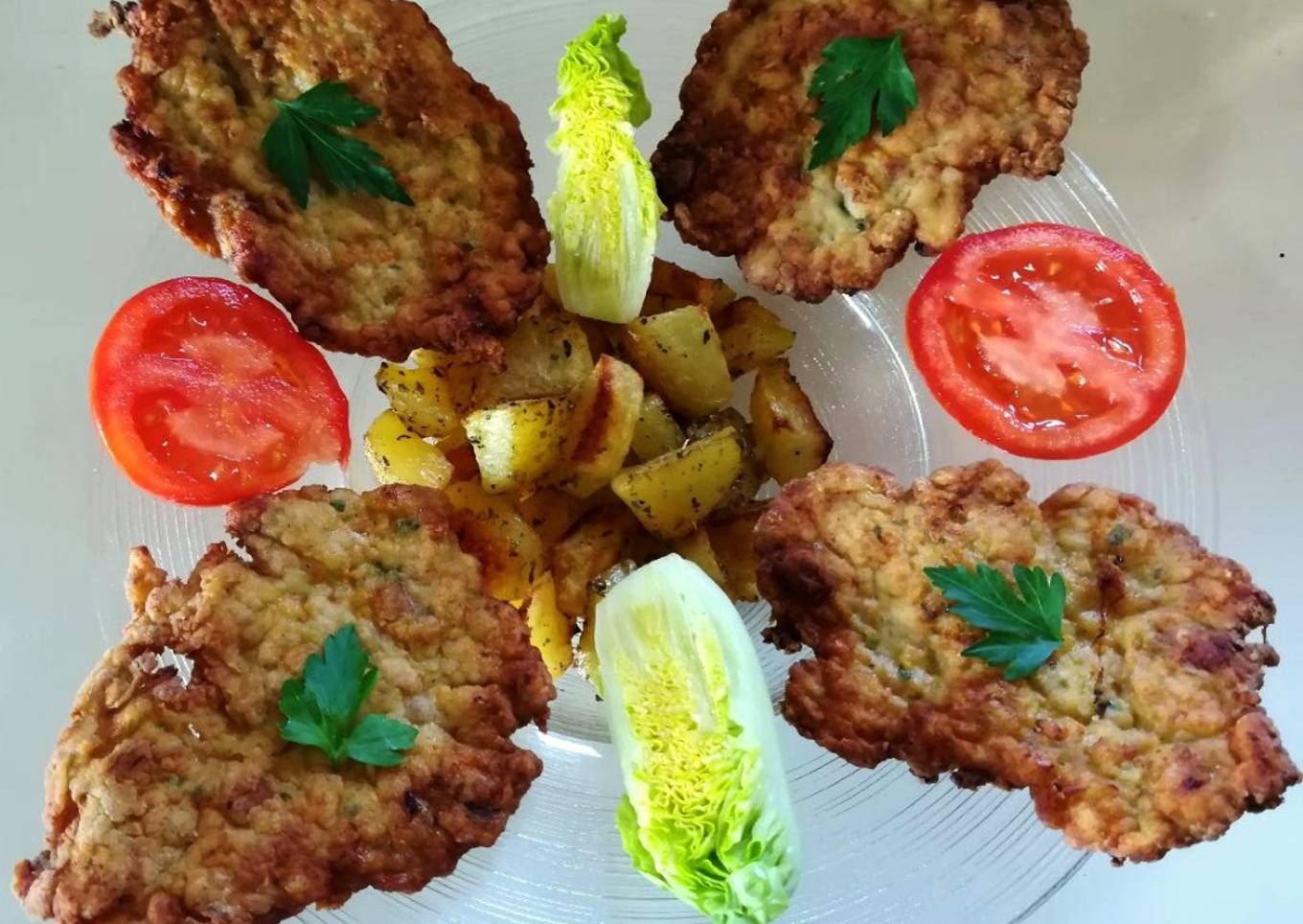 Filetes de pollo semi rusos con patatas al horno