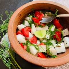A picture of Radish Tomato Dill Salad.