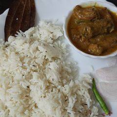 A picture of Chicken with jeera rice.