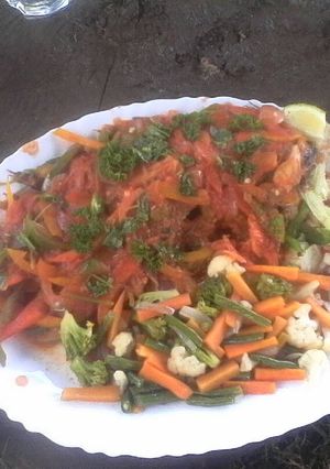 A picture of Wet fry fish with vegetables.
