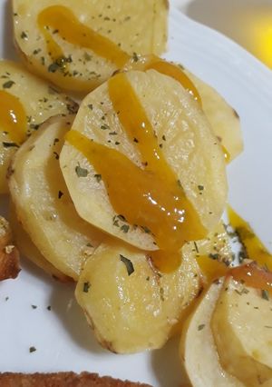 Una foto de Papas al horno que salen de la rutina!