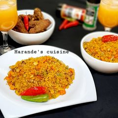 A picture of Stir fried curry and turmeric rice.