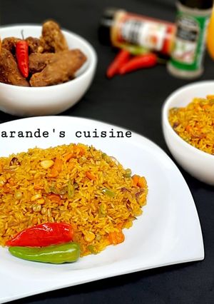 A picture of Stir fried curry and turmeric rice.