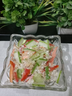 A picture of Quinoa, cucumber salad with curd.
