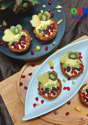 A picture of Granola cups with fruit yogurt filling.