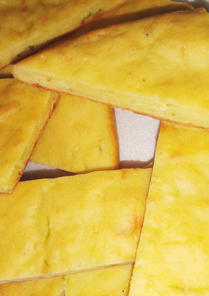 Una foto de Fainá de queso y zapallitos