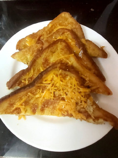A picture of My Eggy Bread with a little Grated Cheese, Quick and Easy too 😘.