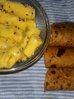 ખાંડવી (Khandvi Recipe In Gujarati) રેસીપી મુખ્ય ફોટો