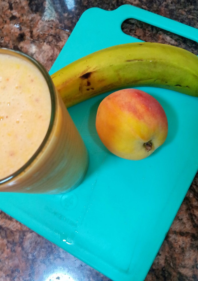 Una foto de Licuado de banana, pelón y naranja