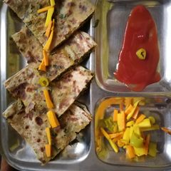 Stuffed muli ke patto ke parathe A picture of Stuffed muli ke patto ke parathe.
