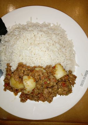 A picture of Cardamon rice with potato sauce.