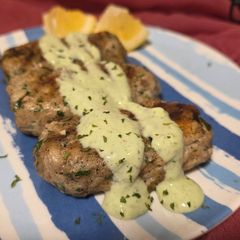 A picture of Chicken kafta with garlic yogurt sauce.