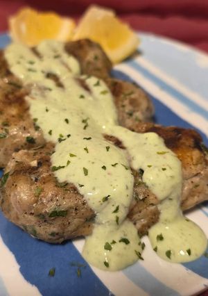 A picture of Chicken kafta with garlic yogurt sauce.