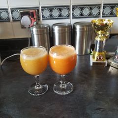 Mango,strawberries drink and Carrot, apples drink with ginger A picture of Mango,strawberries drink and Carrot, apples drink with ginger.