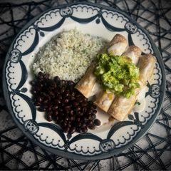 A picture of Graveyard Combo: Coffin Crunch Taquitos, Ghostly Rice & Ghoul Guac 👻✨.