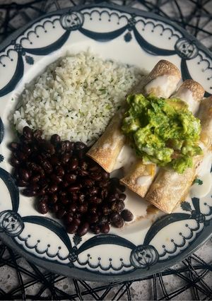 A picture of Graveyard Combo: Coffin Crunch Taquitos, Ghostly Rice & Ghoul Guac 👻✨.