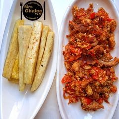 A picture of Fried Yam with fish and egg sauce.