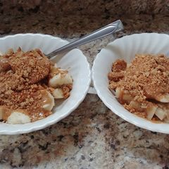 A picture of Breakfast fruit granola bowl.