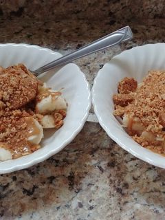 A picture of Breakfast fruit granola bowl.